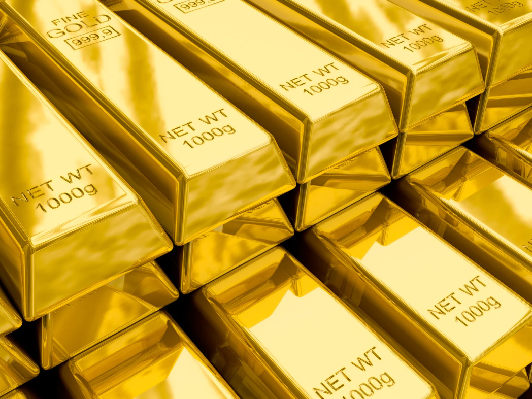 Gold bars piled up. Each of them have Net Wt 1000g