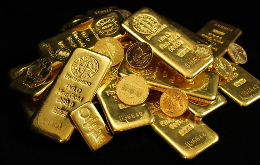 Pile of various gold coins and bars